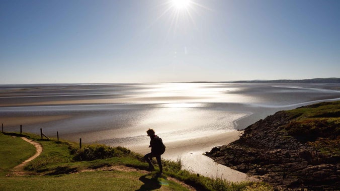 A walker on the clifftop at Arnside and Silverdale